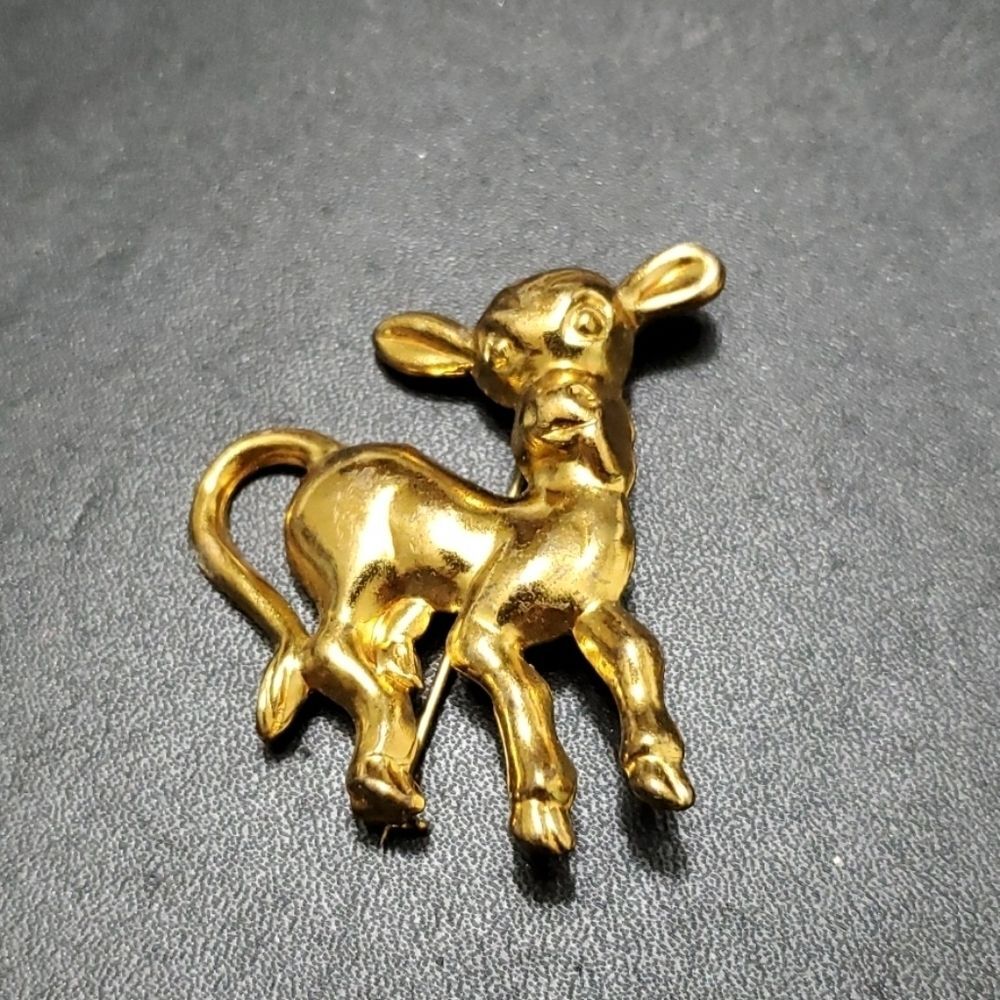 Vintage gold tone donkey brooch